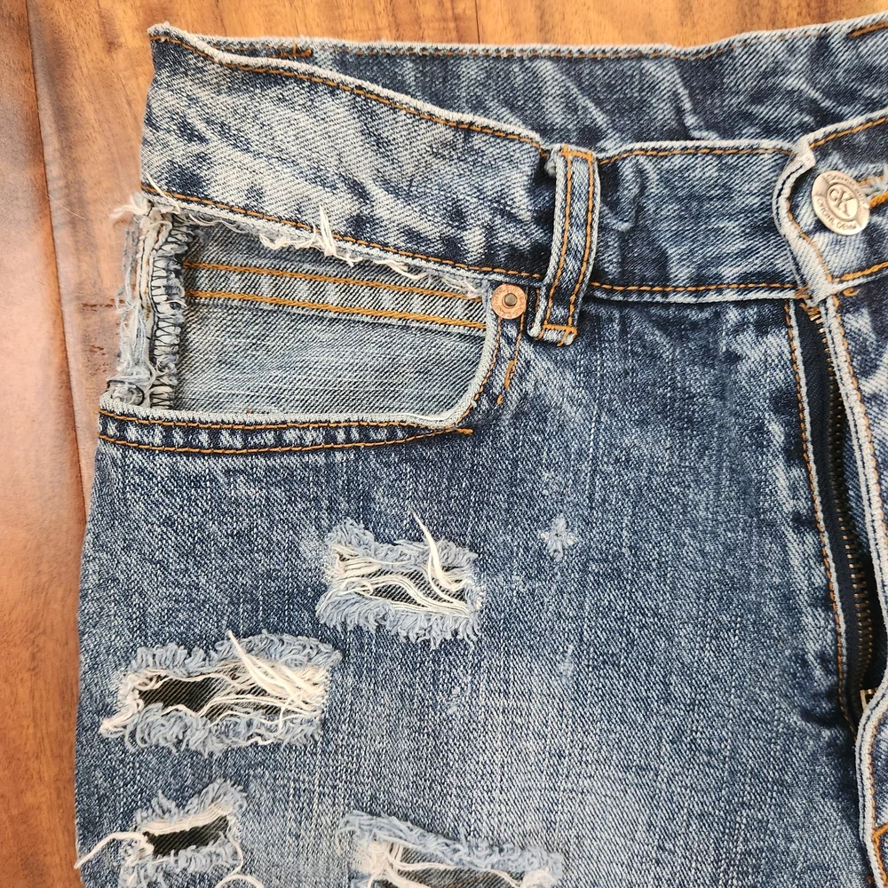 Vintage Calvin Klein Jeans Ripped Blue Jean Shorts, Size 28